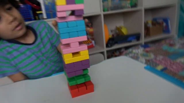 Adam Playing With Colored Toy Blocks | Jenga Game Family Fun Video