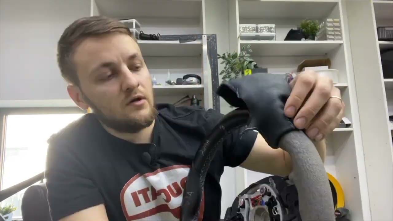 Демонтаж кожи с руля на котором есть обогрев
