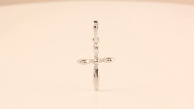 Декоративный крестик из белого золота