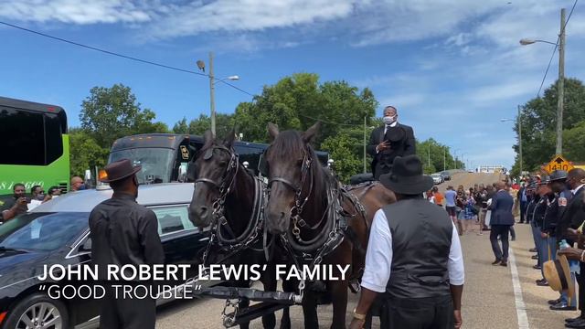 Congressman John Lewis Crosses The Edmund Pettus Bridge In Horse-Drawn Caisson In SELMA, AL