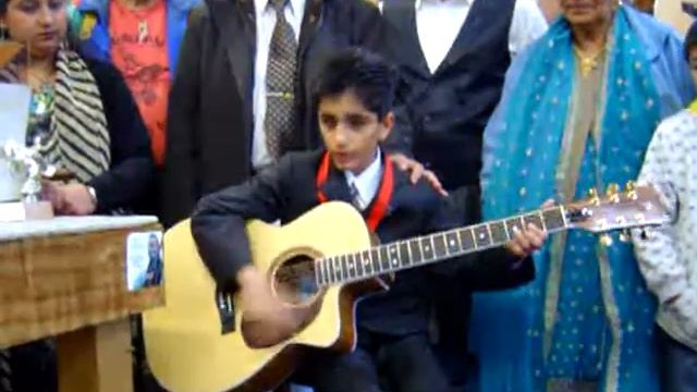 11 Year Old Michael Chopra Of Tokoroa Playing A Price Guitar From Toadstool Guitars Tokoroa