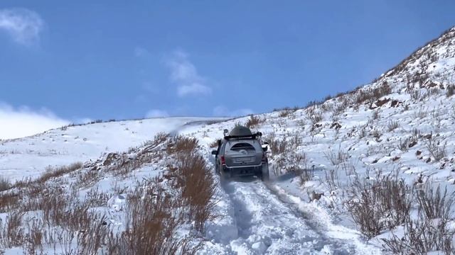 Jeep Cherokee In Deep Snow. Kazakhstan. Mountains. The Roads. Ущелье Кастек.