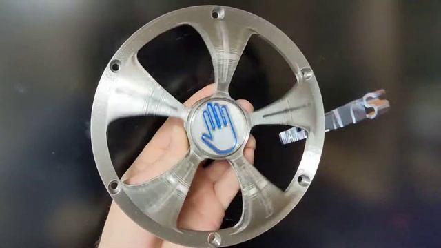 Spinning rim speaker cover