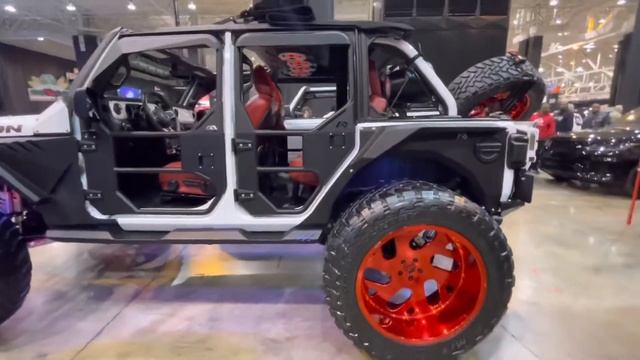 FDM Josh: Jeep Wrangler Rubicon, 42” Tires, Forgiatos , Willwood Brakes. Custom Red Interior.