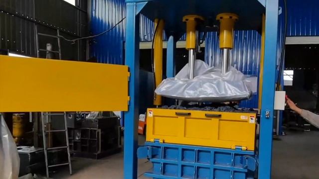 Pressing Clothes In Industry Vertical Balers For Textiles