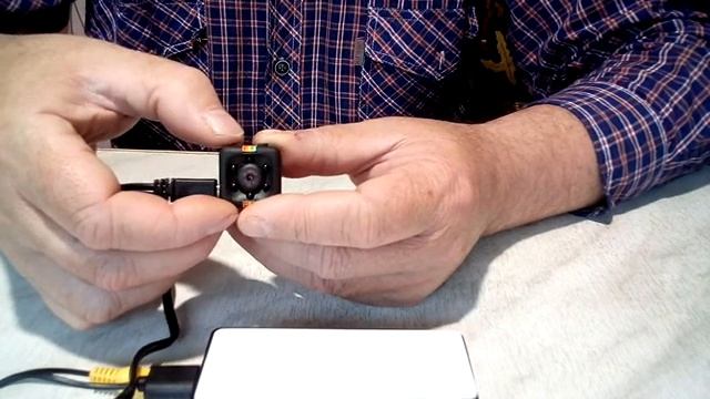 супер функции  камеры-малютки SQ11