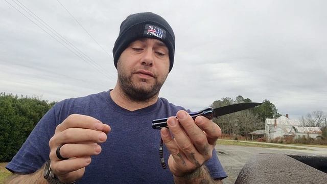 Komoran titanium frame lock