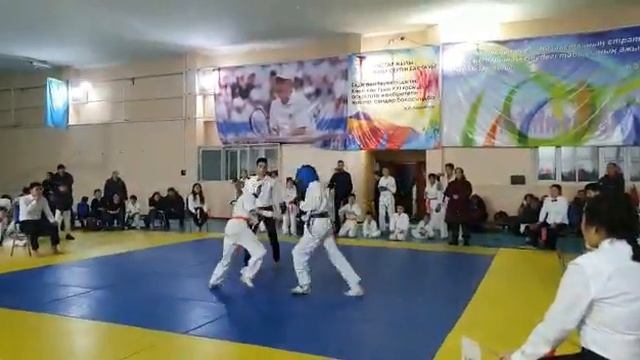 Алженбай Жасулан (белый шлем)