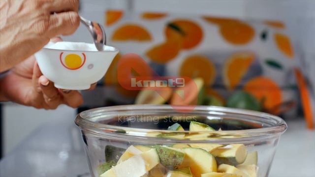 A Woman Adding Salt Into Raw Mango With A Spoon For Pickle Pre... | Indian Stock Footage | Knot9