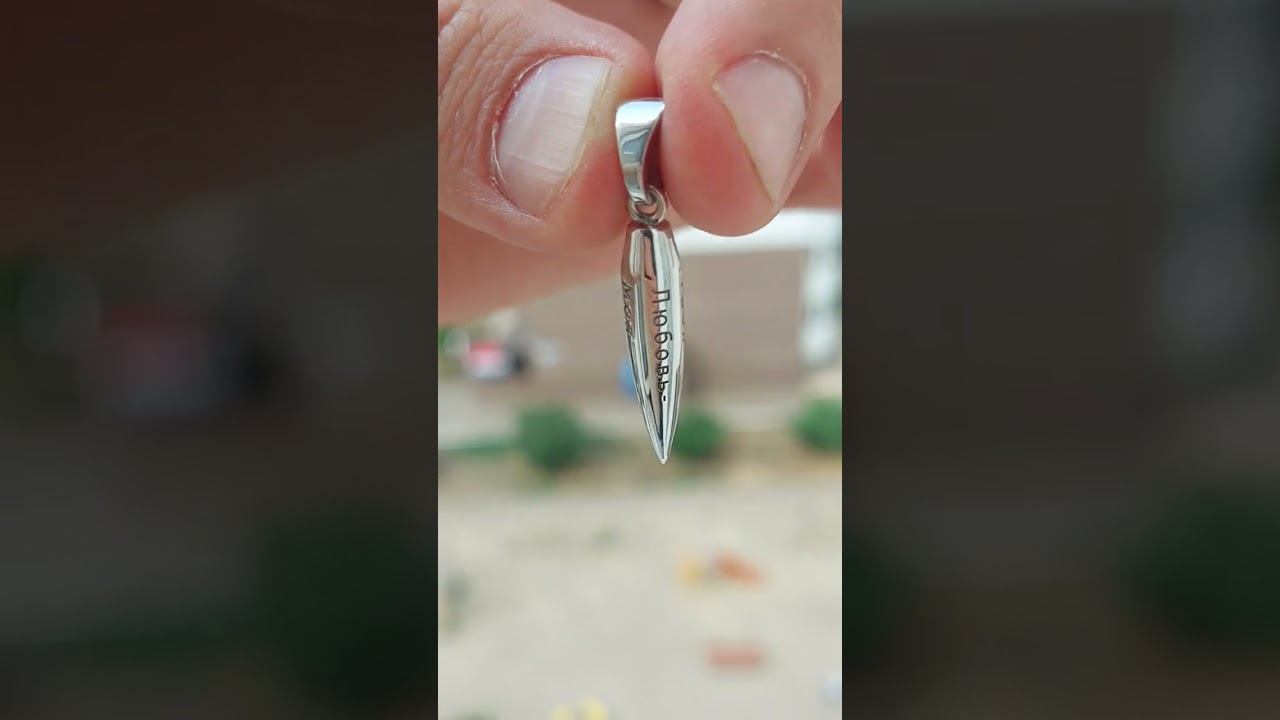 Пуля от Калашникова 5.45. Белое золото, с надписью. Вес 6 грамм