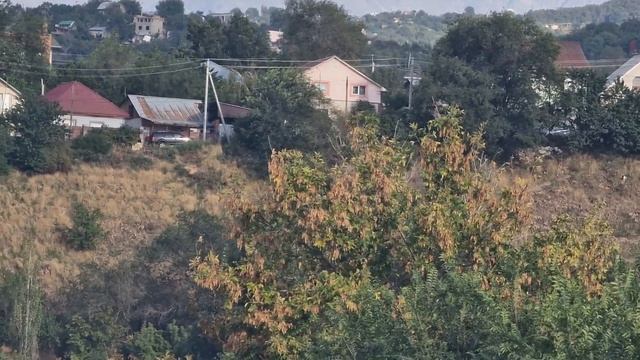 Алма-Ата. Вид с моста  на ул. Толе би( Комсомольская) Выезд на Восточку.   ПИК Талгар.  7 09 2023.