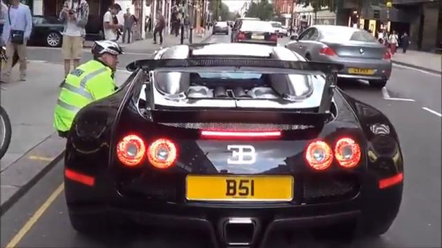 Sikh Man (Indian) Racing A Black Bugatti In London