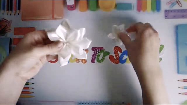 Повязка для малышки. Цветок в технике канзаши.