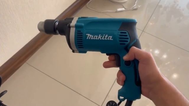 Ударная дрель Макита