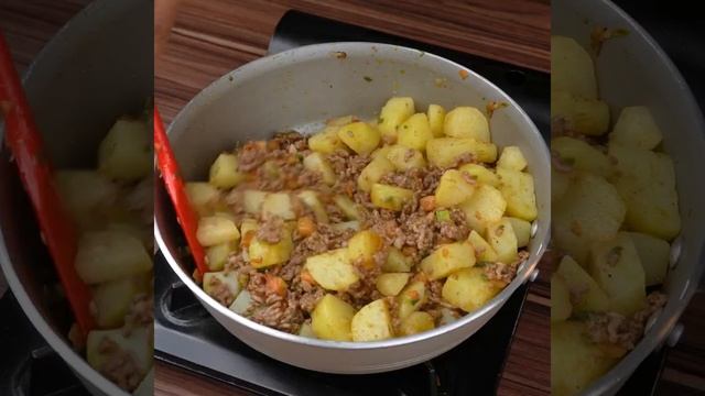 Испанское блюдо,запеканка из фарша и картошки.