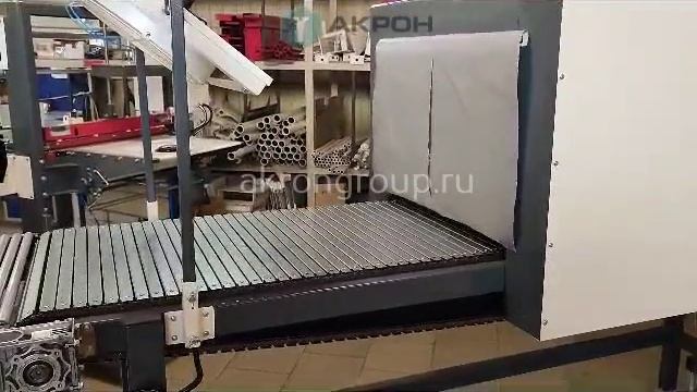 Упаковка бутылок на аппарате ТМ-1А ПП