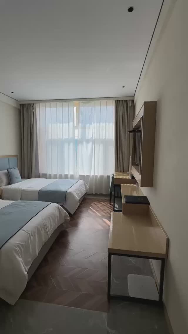 Видеообзор гостиницы Модерн, г ХэйХэ, номер Стандарт