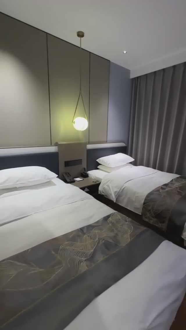 Видеообзор гостиницы Ида (Yi Da), г ХэйХэ, номер Стандарт