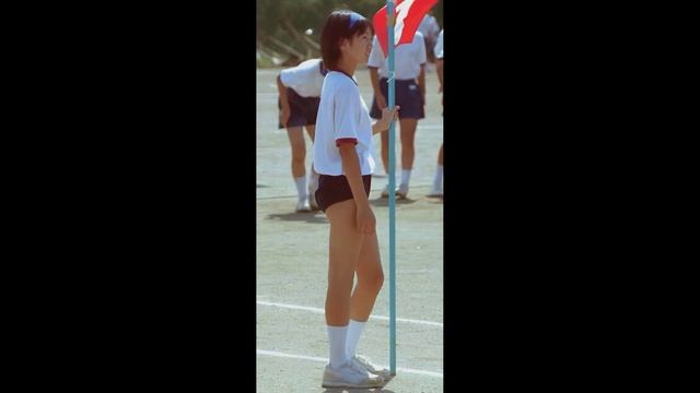 The Smiling Faces Of Four Girls In Cute Japanese Gym Uniforms