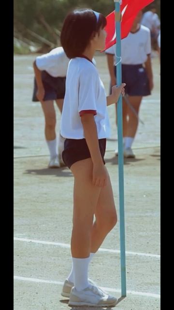 The Smiling Faces Of Four Girls In Cute Japanese Gym Uniforms
