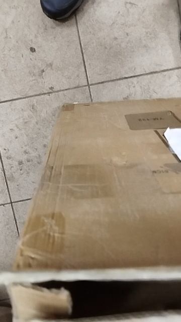 осмотр внешней упаковки стола после возврата