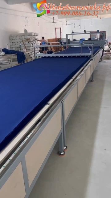 Раскладчик- машина для протягивания ткани с зажимами