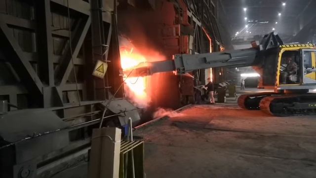 Машина для очистки горла конвертера от шлаковых заторов