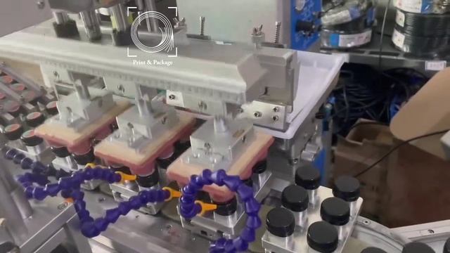 Автоматическая тампопечатная 2-х красочная линия для печати по крышкам для бутылок