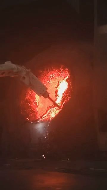 Машина для очистки горла конвертера от наростов шлака