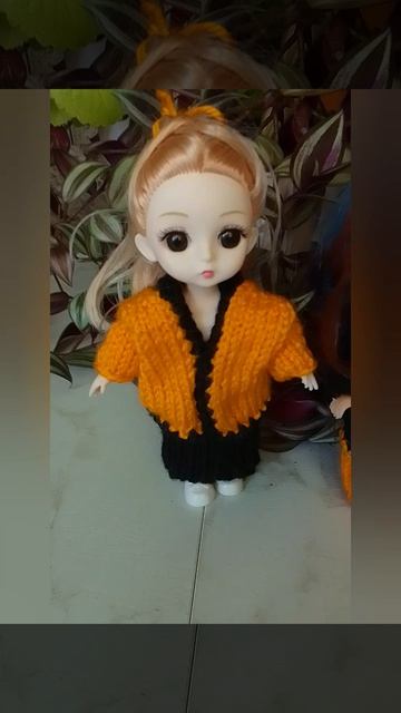 Желто-черная коллекция одежды для куколки.