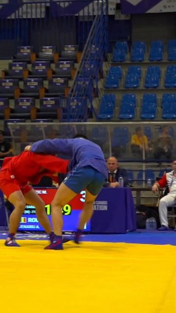 A Spectacular Throw In The Bout Between Milos SAMARDZIC (SRB) And Alexandru JENARIU (ROU)