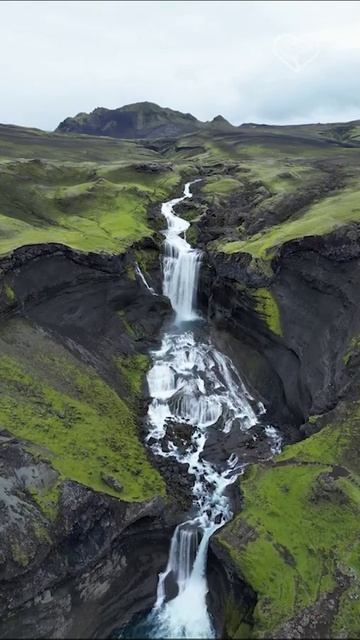 Над водопадом