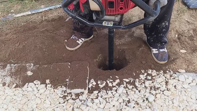 Бурил лунки под столбы и забетонировал столбы для навеса .