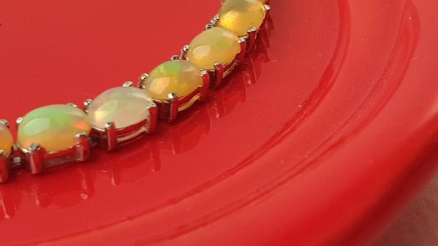 Браслет однорядный с природными эфиопскими опалами