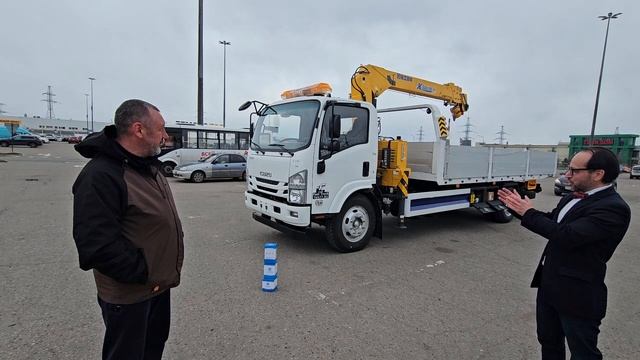 Видеоотзыв и выдача ISUZU эвакуатор с КМУ бортами БЕЛЫЙ  2026 от Фаст Трак  для Александра в Крым