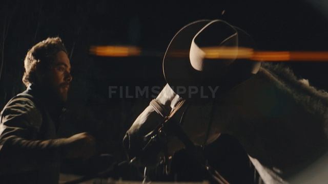 Kyle Tiernan-american-cowboys-roping-at-a-rural-rodeo-872570-filmsupply