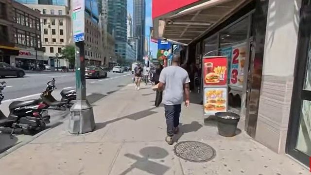 Город Нью Йорк и пешая прогулка по улицам Нью Йорка.