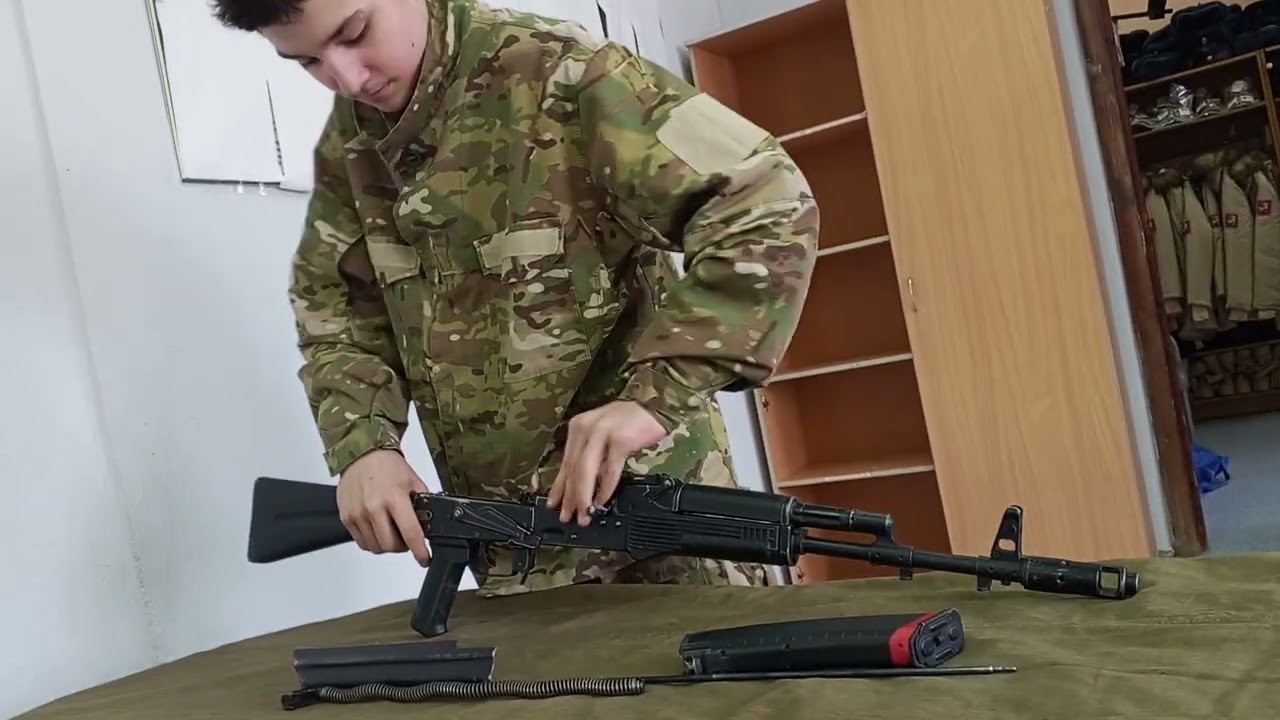 Просто разобрал автомат... Ну и всё...