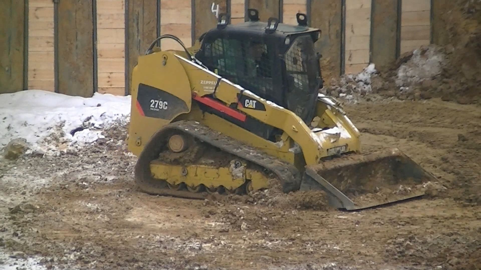 Гусеничный минипогрузчик Cat 279C