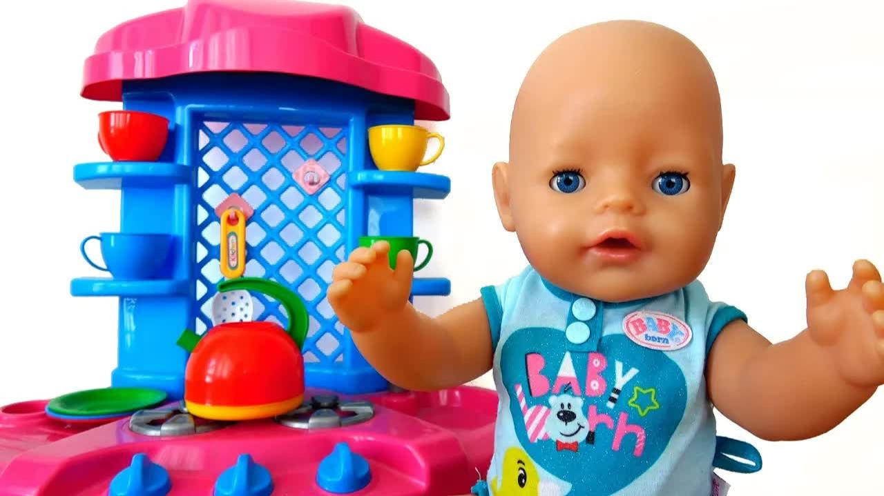 Baby Born show playing with the kitchen