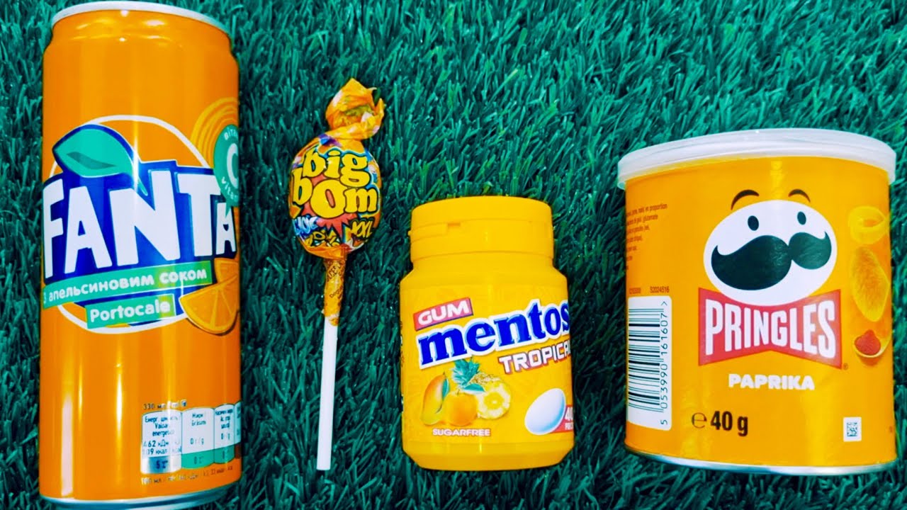 Whispering delights  ASMR orange candy exploration and sampling