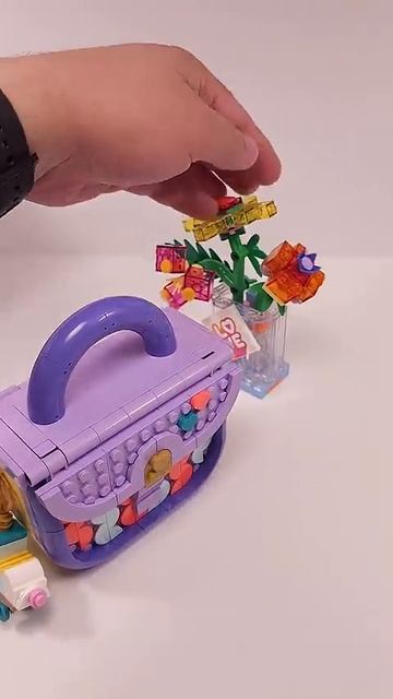 LEGO Creator Ваза с цветами 31383 против сумки Art Fashion с хранилищем 31391
