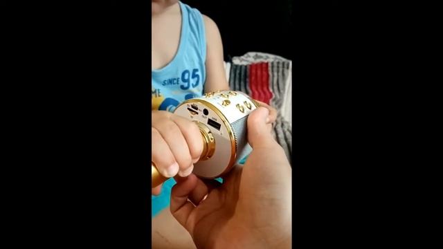 Распаковка Игрушка Qunxing Микрофон Золотой (WS-858-2) из Rozetka