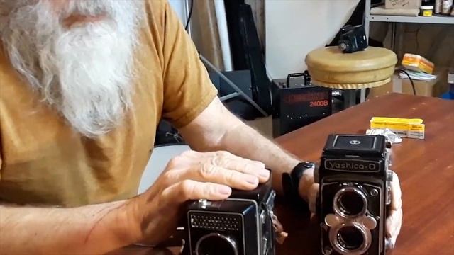 Rolleiflex And Leica Loading Film