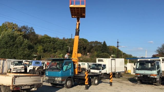 Автовышка платформа Tadano AT-120S на базе авто MMC Canter