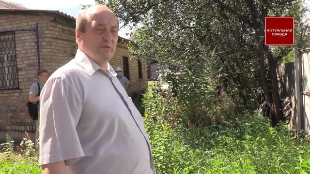 Рейдеры Виктория Ковтун, Игорь Рыжов и Гайдаенко Катерина пытаются захватить кусок земли Ильющенко