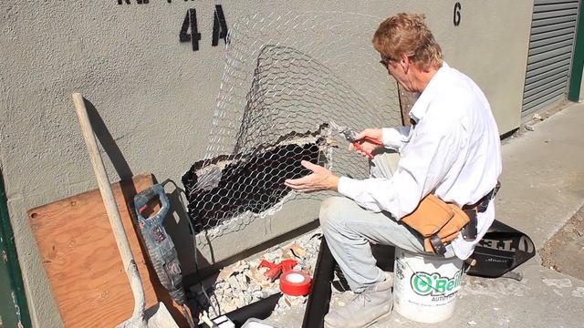 Repair Hole In Stucco Wall Caused By A Car Crash.