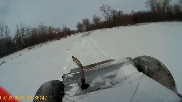 На каракате по мокрому снегу на волге