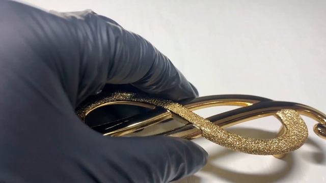 Ручка - скоба Бесконечность от известного итальянского дизайнера Роберто Марелла.