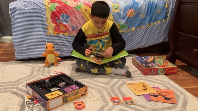 Sam Is Showing How To Play Pokemon Card Game. Battle Academy.